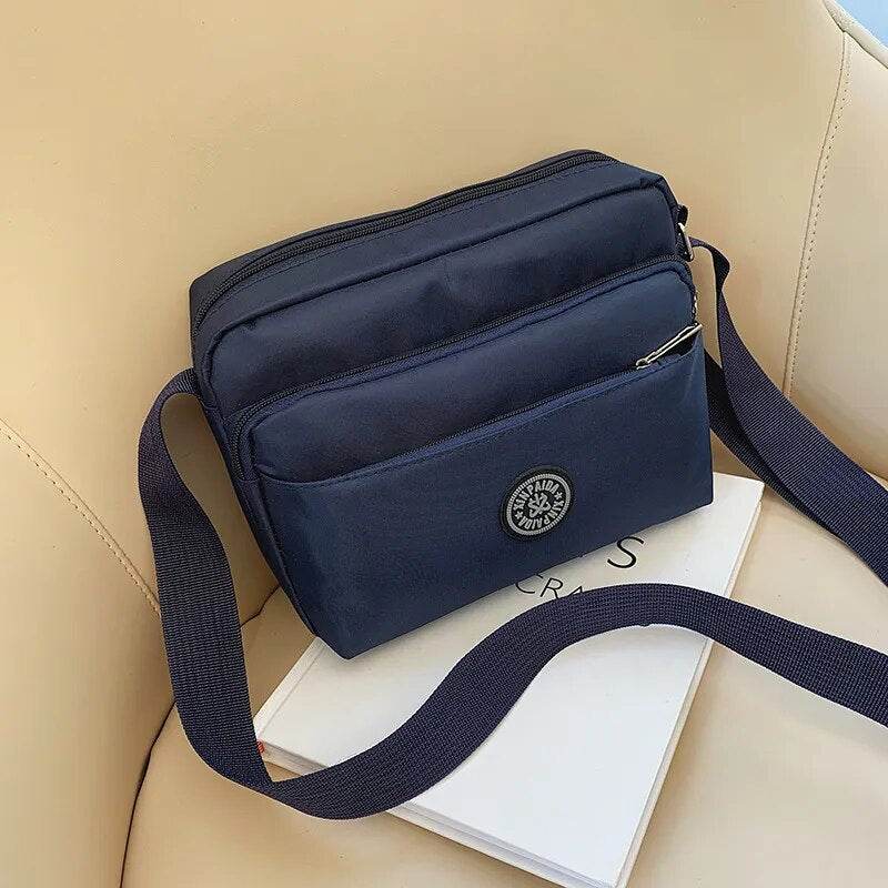2023 New Casual Solid Color Women Bags Luxury Designer Shoulder Bag Nylon Cloth Lady Messenger Bag Mobile Phone Bag Wholesale - Tamnz